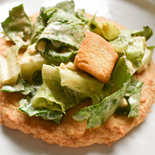 caesar salad on a keto chicken crust