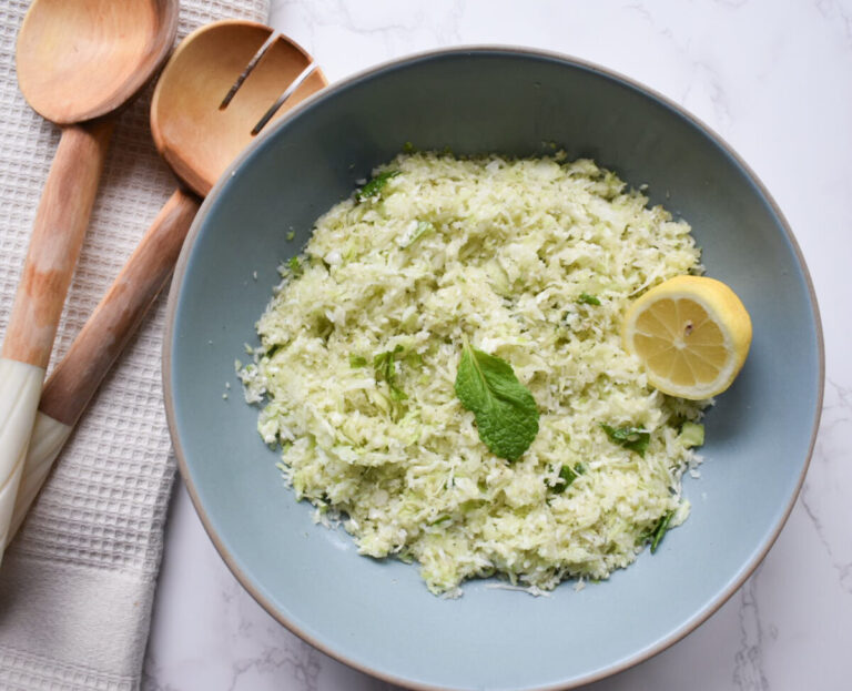 green goddess salad with celery, cabbage, and mint