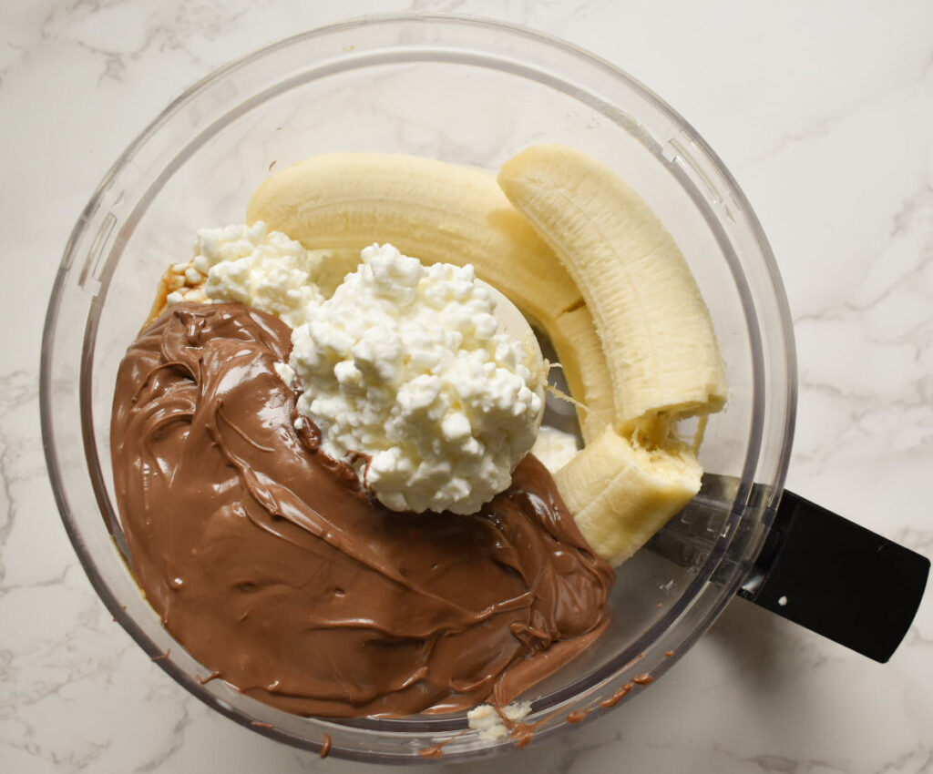 banana, cottage cheese, and melted chocolate in a food processor