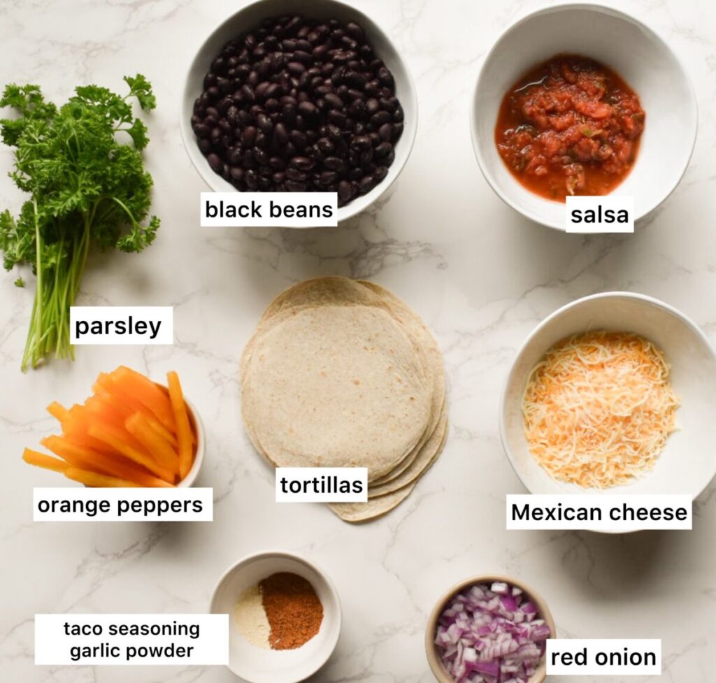 ingredients in vegetarian baked taco made with black beans