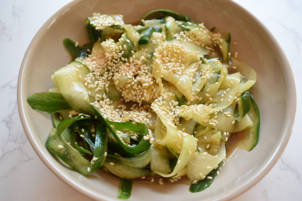 fresh cucumber ribbon salad with ginger and sesame dressing