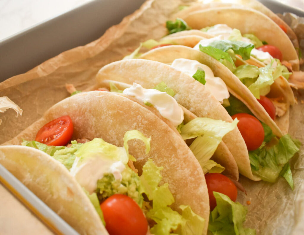 family-friendly baked chicken tacos fresh out of the oven