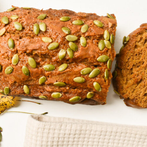 one bowl pumpkin bread topped with pepitas
