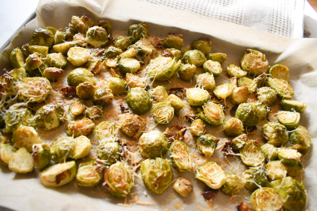 roasted brussels sprouts that are crispy and tossed with cheese