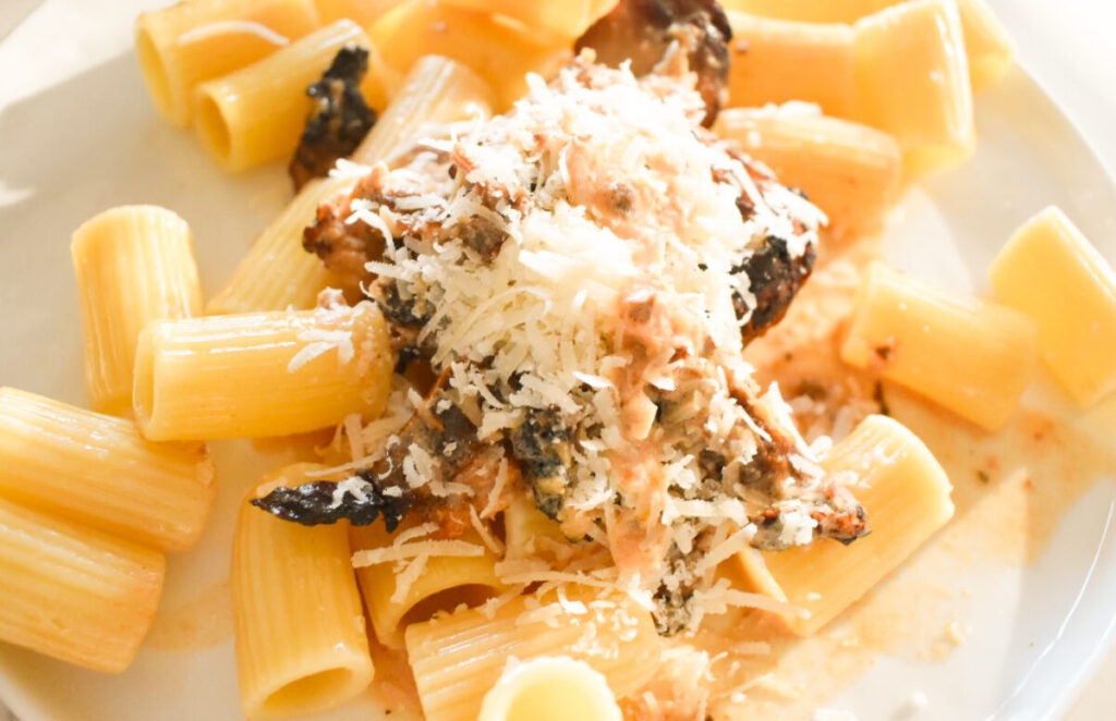 skillet marry me chicken over cooked noodles