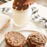Winter dessert plate with hot chocolate cookies and marshmallows