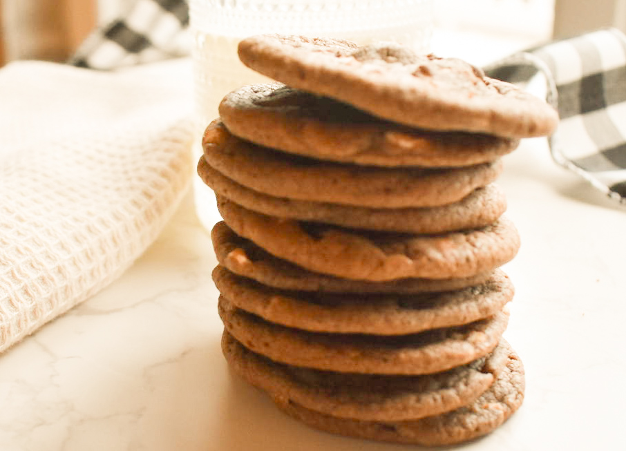 Hot chocolate cookies stacked with marshmallow pieces inside