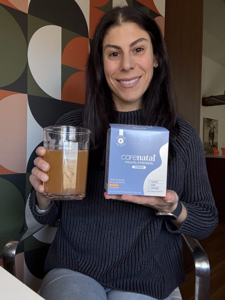 woman with prenatal vitamin powder prepared