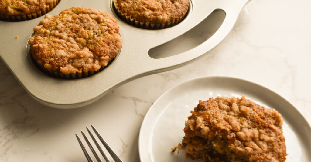 Soft banana muffin interior with crumb topping