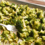 Close-up of oven roasted broccoli with parmesan and lemon