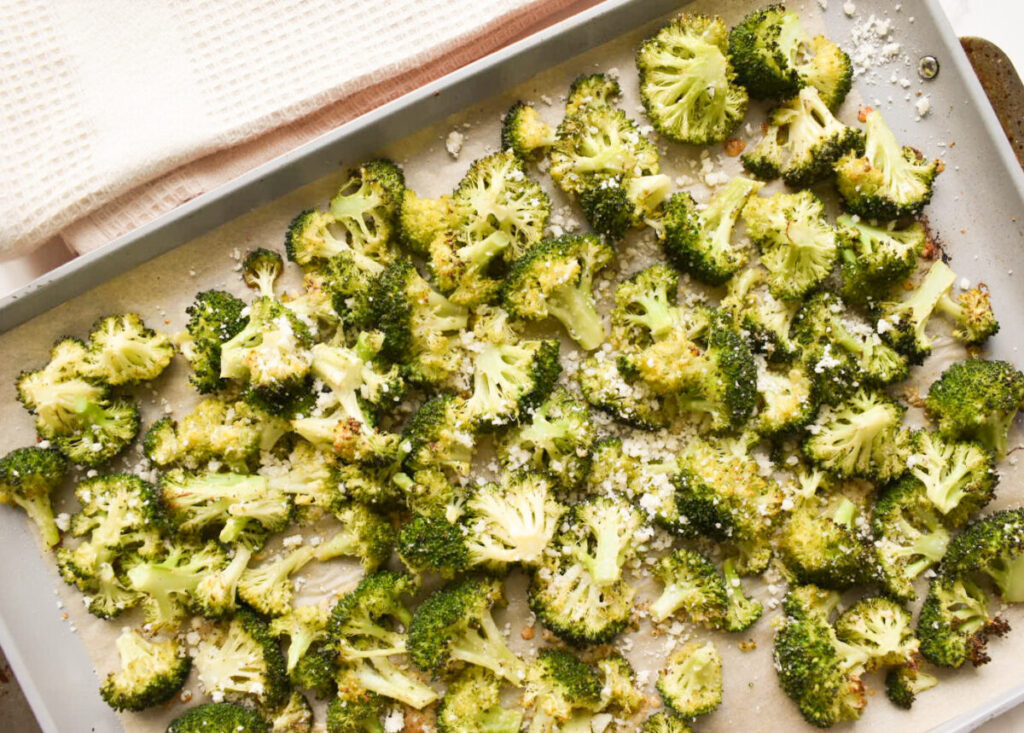 Fresh broccoli florets tossed with olive oil and garlic powder