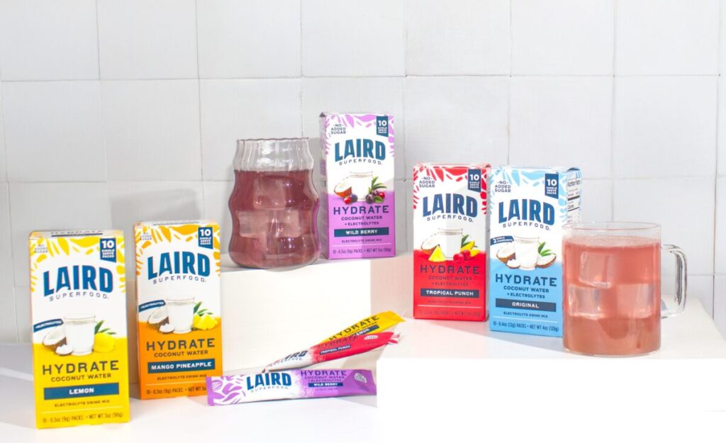 Laird Superfood Hydrate drink mix packets in Wild Berry and Tropical Punch flavors
