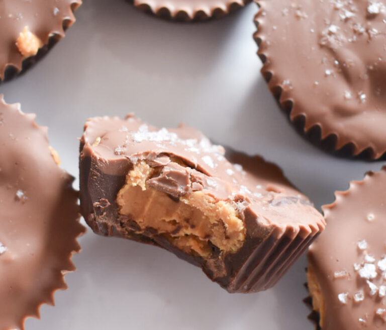 Layered chocolate peanut butter cups showing cross section