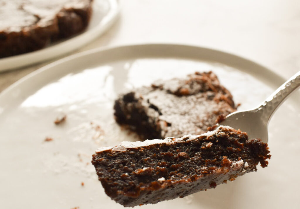 Close-up of dense flourless chocolate cake texture