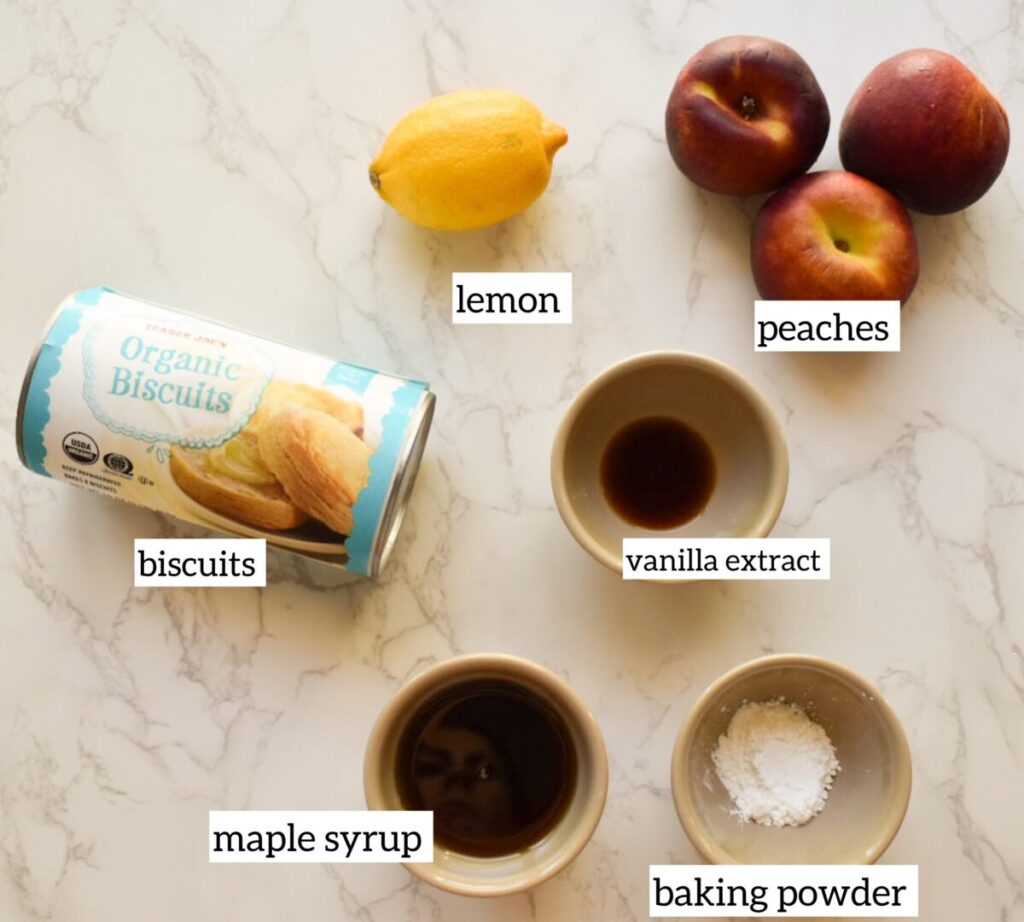 Ingredients in Easy biscuit cobbler recipe in cast iron skillet