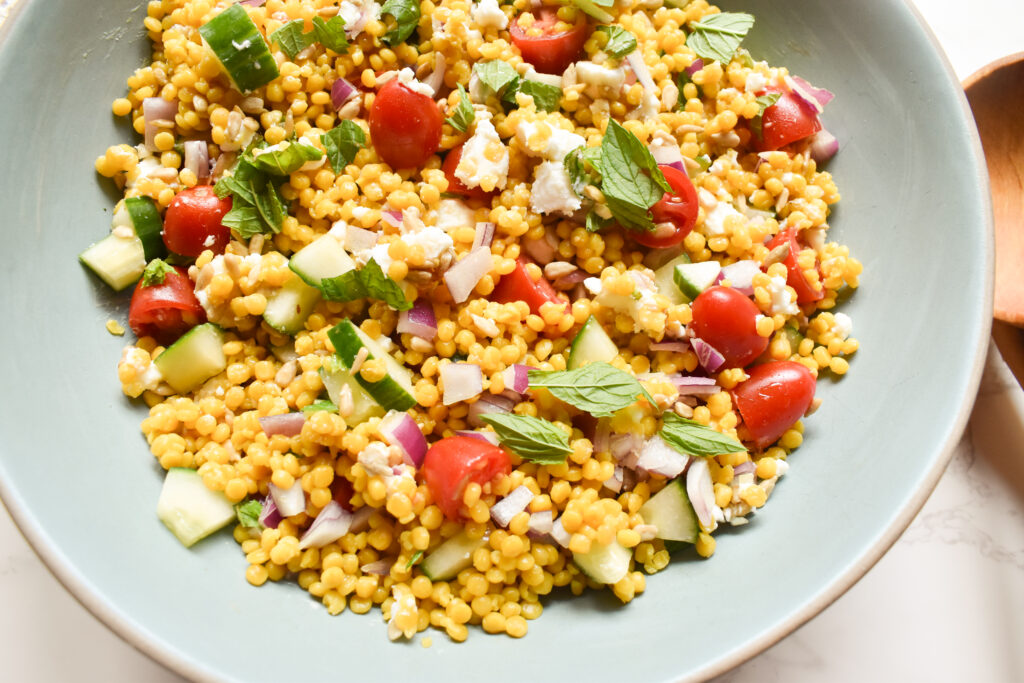 Easy Mediterranean Israeli couscous salad with lemon and olive oil dressing