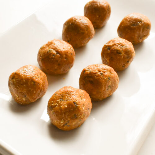 Pumpkin peanut butter energy balls on a plate